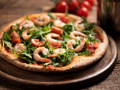 Skarbówka wpadła na pizzę. Skończyło się mandatem na 2500 zł