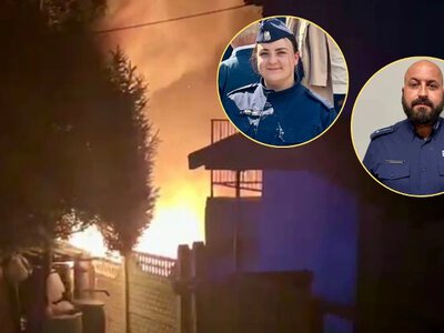 Bohaterska postawa policjantów. Wydostali seniorkę z płonącego budynku